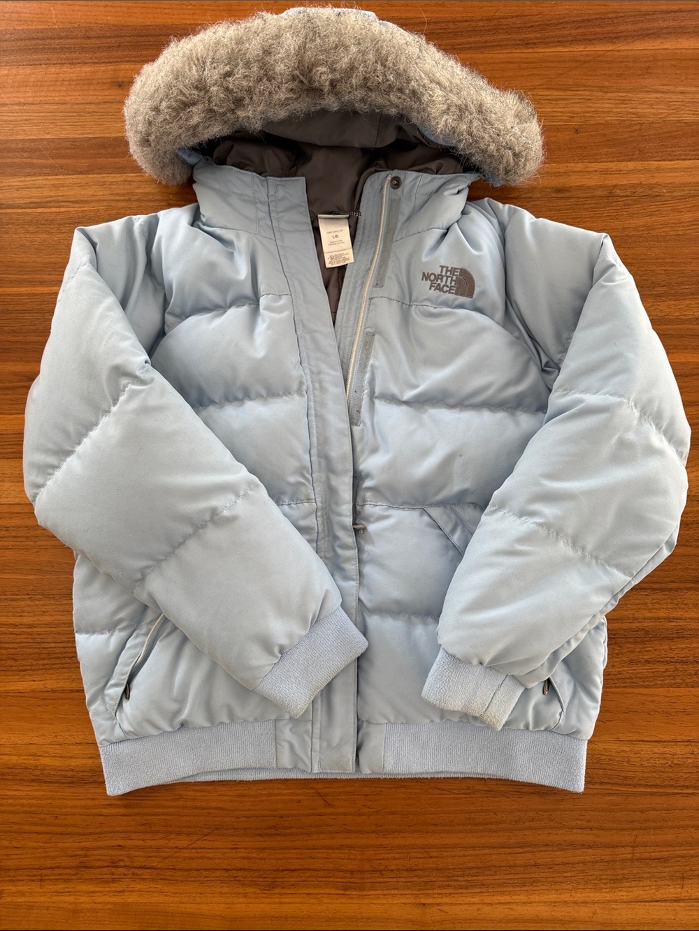 The North Face Gotham Puffer Jacket with a faux fur hood. Sz girls large